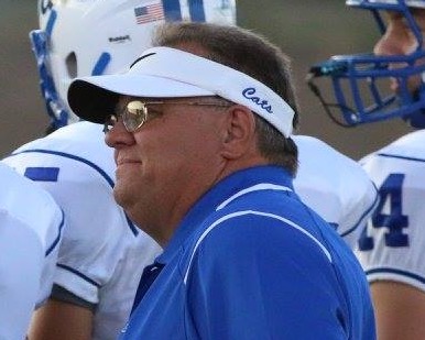 Coach John “Speedy” Faith