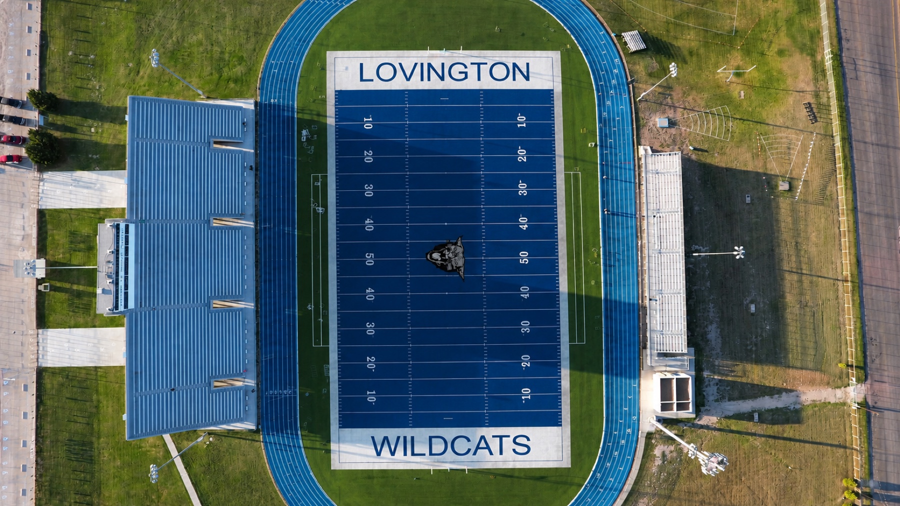 Aerial view of Wildcat Stadium and its blue football field in Lovington, New Mexico